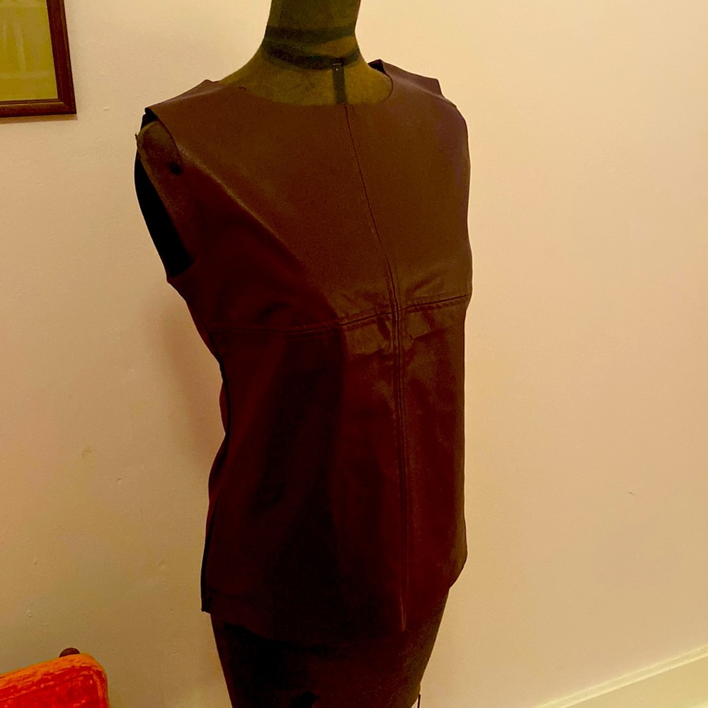 Faux Leather sleeveless top.